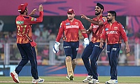 Punjab Kings' Arshdeep Singh celebrates the wicket of Rajasthan Royals' Ravichandran Ashwin