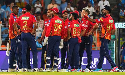 Punjab King's bowler Kagiso Rabada celebrate with teammates during the (IPL)