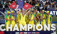 Australia captain Aaron Finch celebrates with the trophy and teammates after winning the ICC Men's T20 World Cup