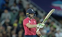 Jos Buttler celebrates his half century
