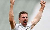 South Africa's Anrich Nortje celebrates dismissing Australia's David Warner