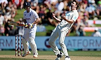 New Zealand's Blair Tickner (R) celebrates his wicket of England's Harry Brook (L) during day three of the first Test at Bay Oval