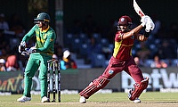 West Indies' Shai Hope watches his shot