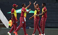 West Indies players celebrates the wicket of South Africa's Aiden Markram