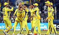 CSK bowler Tushar Deshpande with teammates celebrate the dismissal of MI captain Rohit Sharma