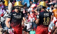 Faf du Plessis and Virat Kohli celebrate their partnership