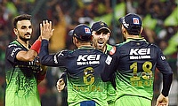 RCB bowler Harshal Patel with teammates celebrate