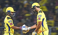 CSK's batsman Shivam Dube celebrates his half-century with teammate Ajinkya Rahane