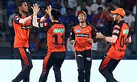 SRH bowler Akeal Hosein with teammates celebrate