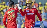 PBKS' Sikandar Raza with teammate Jitesh Sharma celebrate