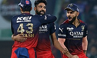 RCB's Mohammed Siraj with teammates celebrate