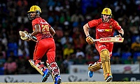 Nicholas Pooran (L) and Lorcan Tucker (R) of Trinbago Knight Riders 50 runs partnership