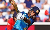 Sri Lanka's Chamari Athapaththu hits six runs off the bowling of England's Charlie Dean