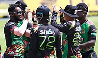 St Kitts & Nevis Patriots players celebrate the run-out of Sean Williams of St Lucia Kings