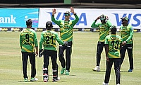 Jamaica Tallawahs players celebrate the wicket of Evin Lewis of St Kitts and Nevis
