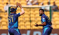 Sri Lanka's Lahiru Kumara celebrates with Maheesh Theekshana