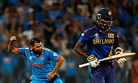 India's Mohammed Shami celebrates after taking the wicket of Sri Lanka's Angelo Mathews