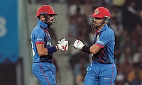 Afghanistan's Ibrahim Zadran and Rahmanullah Gurbaz celebrate their partnership