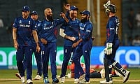 England's Moeen Ali celebrates with teammates