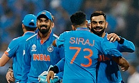 IndiIndia's Virat Kohli celebrates with Mohammed Siraj after winning the matcha's Virat Kohli celebrates with Mohammed Siraj after winning the match