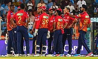 Punjab King's bowler Kagiso Rabada celebrate with teammates during the (IPL)