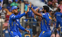 Mumbai Indian's bowler Jasprit Bumrah celebrates after taking wicket of Delhi Capitals' Abishek Porel during the IPL