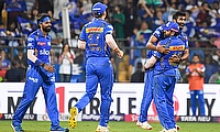 Mumbai Indians' Jasprit Bumrah celebrates the wicket of Royal Challengers Bengaluru's Vyshak Vijay