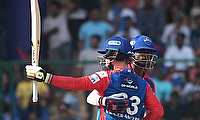 Delhi Capitals' Abishek Porel congratulates his teammate Jake Fraser-McGurk for his half-century during the IPL