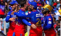 Royal Challengers Bengaluru' Glenn Maxwell celebrates with teammates