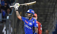Mumbai Indians' Suryakumar Yadav celebrates his half-century