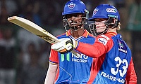 Delhi Capitals' Jake Fraser-McGurk celebrates his half-century