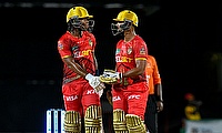 Keacy Carty (L) and Nicholas Pooran (R) of Trinbago Knight Riders 100 runs partnership