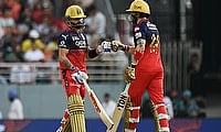 Royal Challengers Bengaluru's Virat Kohli bumps fists with Phil Salt