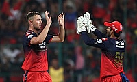 Royal Challengers Bengaluru's Josh Hazlewood celebrates the wicket of Rajasthan Royals' Shimron Hetmyer