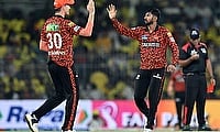 Sunrisers Hyderabad's Kamindu Mendis celebrates with Pat Cummins