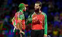 Imran Tahir (L) and Moeen Ali (R) of Guyana Amazon Warriors
