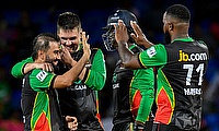Waqar Salamkheil (L) and Rilee Rossouw (R) of Saint Kitts and Nevis Patriots celebrate