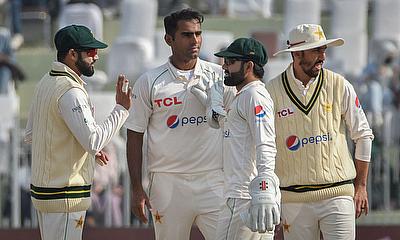 Pakistan's Mohammad Ali (2-L) celebrates with his team mates after taking the wicket of England's Will Jacks
