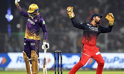Venkatesh Iyer and RCB wicket-keeper Dinesk Karthik