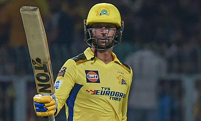 CSK batsman Devon Conway celebrates his half-century alt=