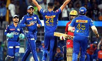 MI bowler Arjun Tendulkar with teammates celebrate the dismissal of PBKS Prabhsimran Singh