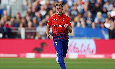 England's Luke Wood celebrates after taking the wicket of New Zealand's Devon Conway alt=