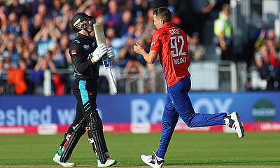 England's Brydon Carse celebrates after taking the wicket of New Zealand's Finn Allen alt=