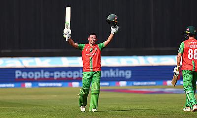 Harry Swindells acknowledges the crowd on reaching 100 alt=