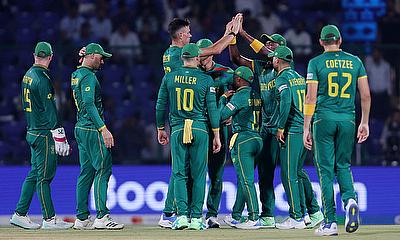 South Africa's Marco Jansen celebrates with teammates after taking the wicket of Sri Lanka's Kusal Perera