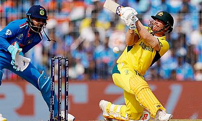 Australia's David Warner in action as India's wicketkeeper KL Rahul alt=