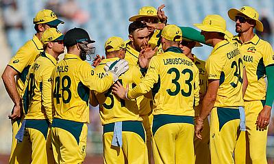 Australia's David Warner celebrates with teammates after taking a catch to dismiss South Africa's Temba Bavuma alt=