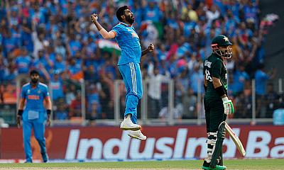 India's Jasprit Bumrah celebrates after taking the wicket of Pakistan's Mohammad Rizwan alt=
