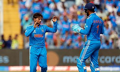 India's Kuldeep Yadav celebrates with KL Rahul after taking the lbw wicket of Bangladesh's Tanzid Hasan alt=