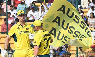 Australia's David Warner and Mitchell Marsh celebrate their partnership alt=